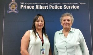 Julie Naytowhow with Elder Julie Pitzel at Prince Albert police headquarters. Photo by Chelsea Laskowski